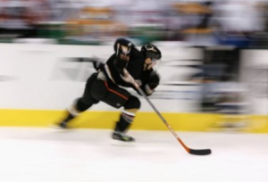 Image of hockey player skating.